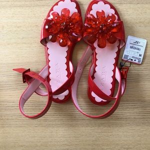 Zara red patent sandals with flower embellishment.